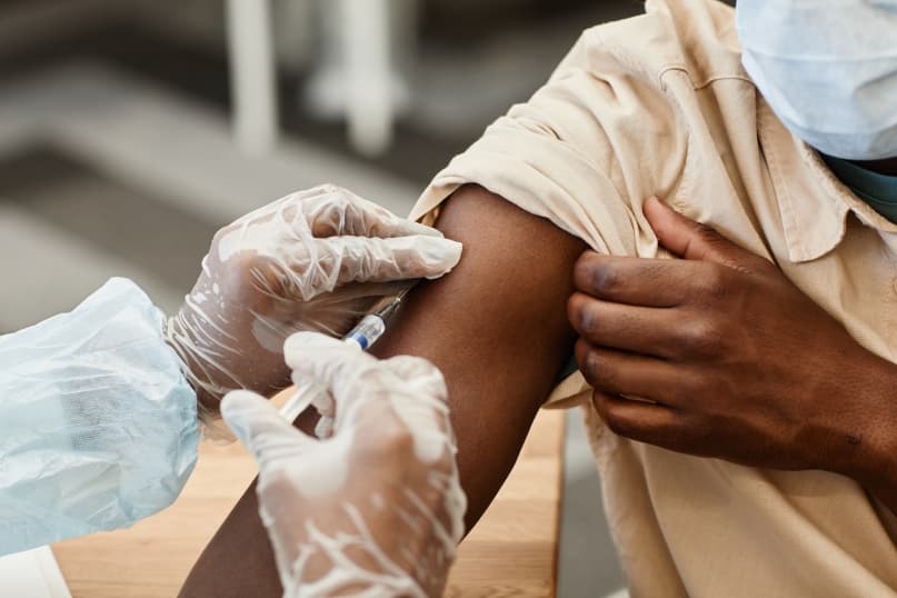 Nurse administering a vaccination